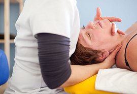 Neck manipulation by physical therapist